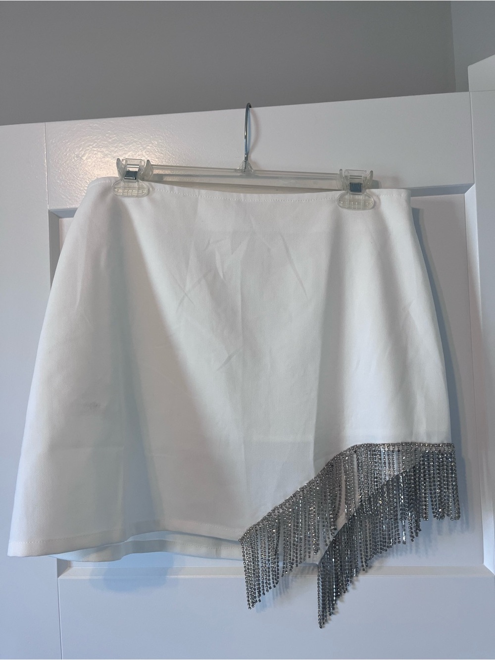 Francesca's Collections White Asymmetrical Mini Skirt with Silver Fringe